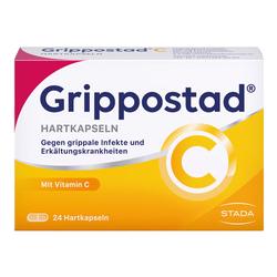 Packung mit Erkältungskapseln und Vitamin C gegen grippale Infekte, 24 Stück.